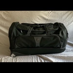 Tumi Wheeled Duffle 30 in H, 16 by 14 . 2 wheels